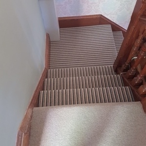 Striped Carpet Fitted On To Stairs